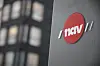 Bilde av Nav-logo foran en fasade.