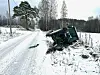 Veltet traktor i grøfta.