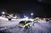 Rallybiler på en opplyst, snødekt bane ved Kjerringåsen alpinsenter om kvelden.