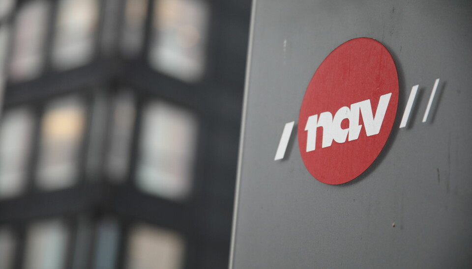 Bilde av Nav- logo på en husvegg.