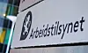 Skilt med Arbeidstilsynets logo og navn utenfor en bygning.